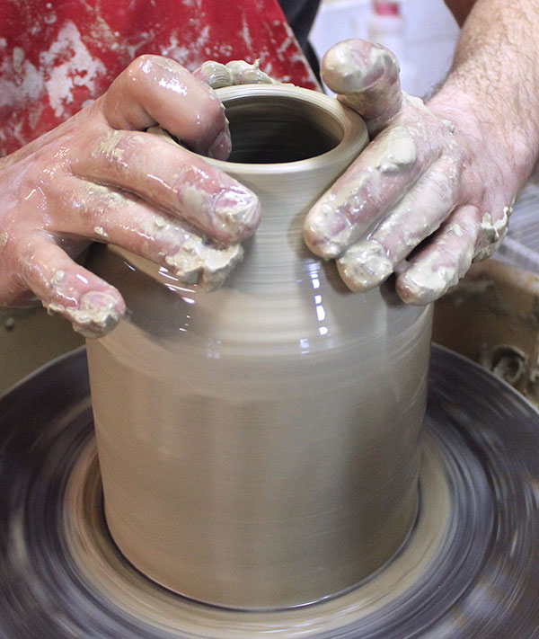 5 Collar in the top third; pull inward from the shoulder in toward the center.