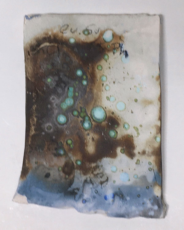 6 Copper sulfate on top; cobalt sulfate on bottom; potassium phosphate over all. 