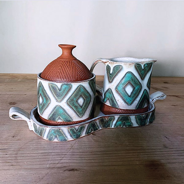 2 Cream and sugar set, 12 in. (30 cm) in length, wheel-thrown and handbuilt mid-range red stoneware, glaze, fired to cone 5, 2019.