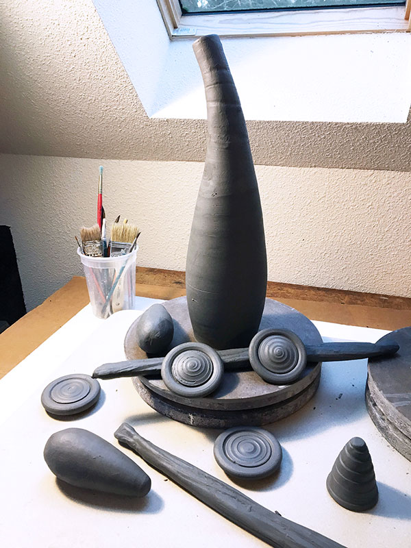 1 Wheel-thrown and handbuilt leather-hard parts ready for assembly.
