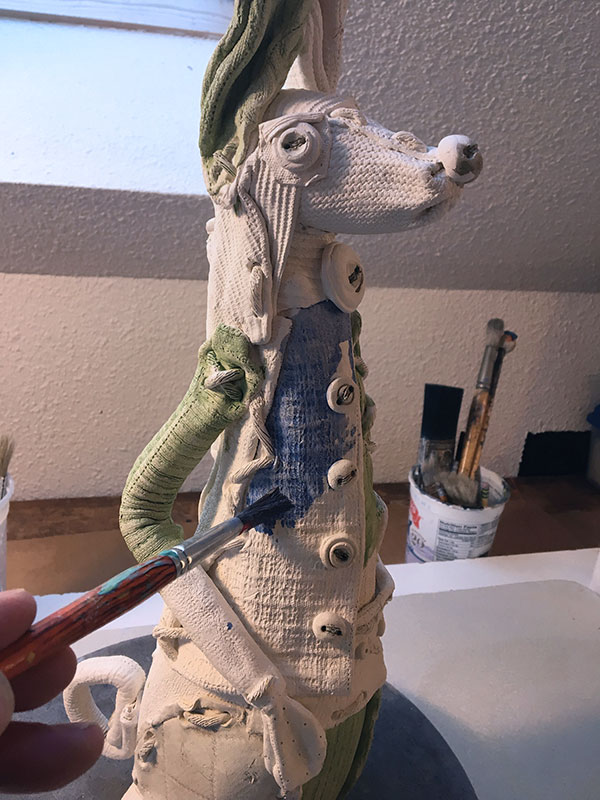 10 After bisque firing to cone 03, apply underglaze color.