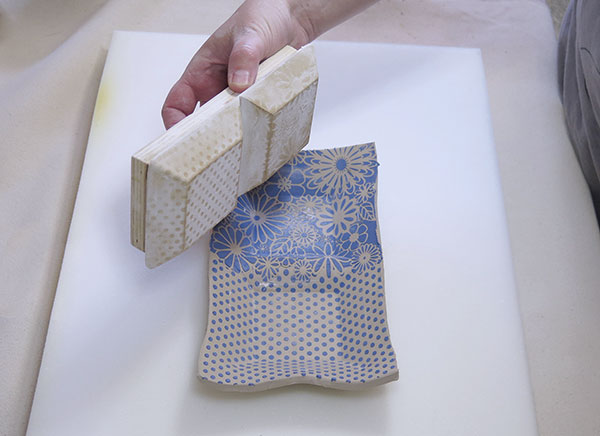 7 Glue two GR Pottery Forms to a board and press firmly down into the slab. 