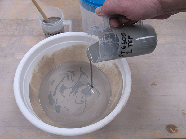 5 Marbleize slip by pouring colored slips together.