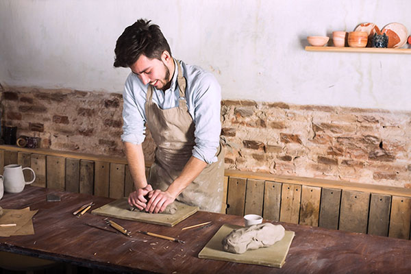 6 While wedging clay, your hands are in an awkward position out of necessity, so don’t spend an entire hour wedging clay. Wedge a few balls of clay, then take a break to do something else. Set a timer for 15 minutes, then when it goes off, stop wedging and take a 5-minute break to stretch and relax your hands. 