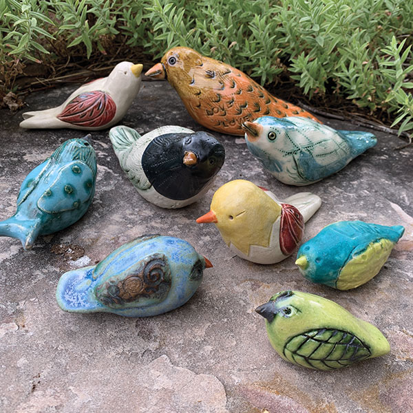 2 Hopeful Birds made by community members as part of a project started by Rita Vali. 