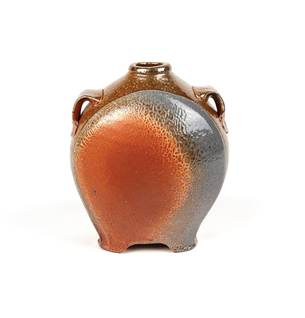 1 Linda McFarling’s small vase, 6 in. (15 cm) in height, wheel-thrown and altered stoneware, flashing slips, soda fired to cone 10 in a gas kiln.