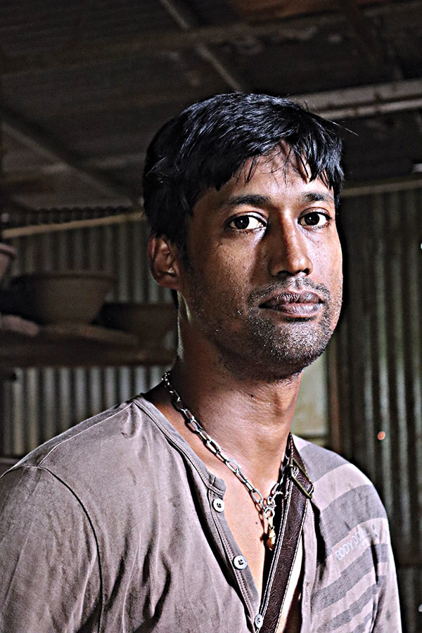 12 Salil, owner of Sasan & Son Pottery.