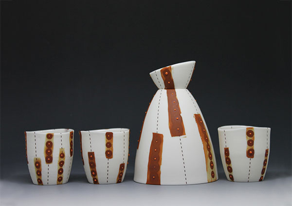 Sake set, to 4¾ in. (12 cm) in height, slip-cast porcelain, assembled, iron sulfate, fired to 2232°F (1222°C).