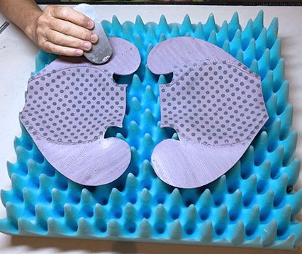 10 Lay both curved sides on foam, facing up, then score and slip the edges.