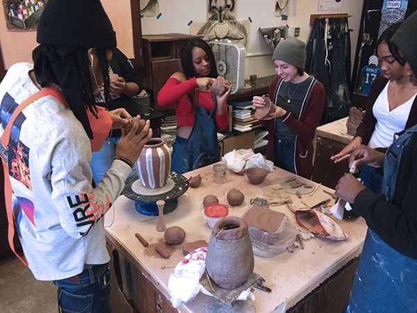 8 2019 Clay Sibling Kyla Culbertson showing students how to pinch at North Community High School in Minneapolis, Minnesota.