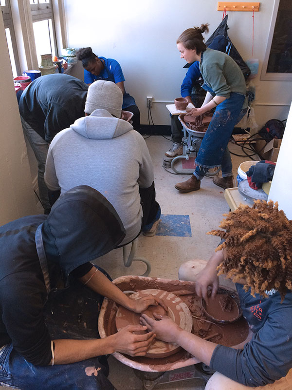 5 2018 Clay Siblings Madeleine Boucher and Gerald A. Brown showing students how to throw during a visit to Westinghouse Academy, Pittsburgh, Pennsylvania.