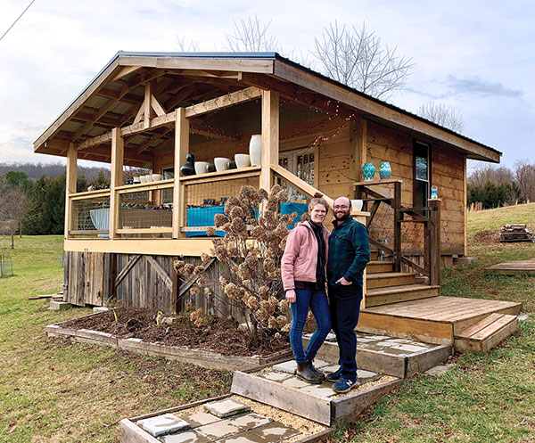 1 Andrea Denniston and Seth Guzovsky outside of the gallery built on their property in Floyd, Virginia. 