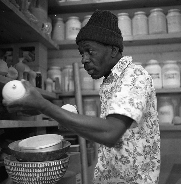 Doyle Lane working in his studio in El Sereno, California, ca. 1976. Photo: Ben Serar.