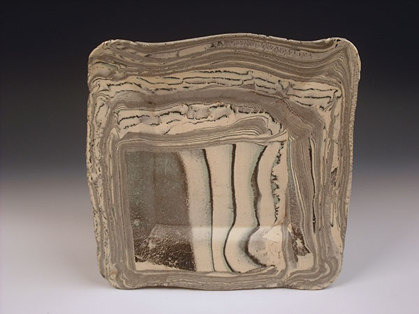 Plate, 10 in. (25 cm) in length, made with a slab incorporating 256 layers of colored clays, 2019.