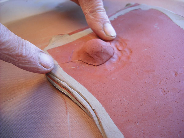 10 Cut off and remove the resulting protrusion on top side.