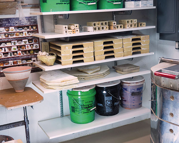2 Track-and-brace shelving system. I purposely placed my kiln furniture at a height that reduces bending.