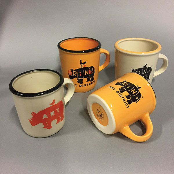 Jonathan Kaplan’s River North Art District (RiNo) branded coffee cups, 4 in. (10 cm) in height, slip-cast whiteware, fired to cone 5, ceramic decals.