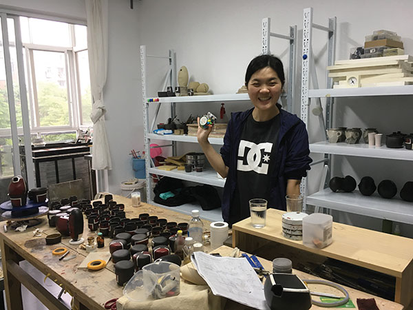 6 Lili Shu’s apprentice Sisi in Shu’s apartment/studio.