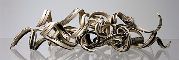 1 Self Reflection, 3 ft. 5 in. (1.2 m) in length, wheel-thrown and altered stoneware, 2012.