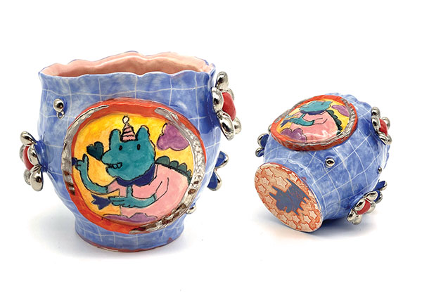 11 Chanakarn Semachai’s Finger Gun Dino Cup, 3 1/2 in. (9 cm) in height, stoneware, underglaze, glaze, luster, 2019. 