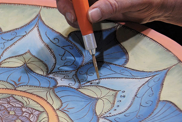 6 Add a variety of lines for finishing details, varying the size and shape of your marks to add visual interest.