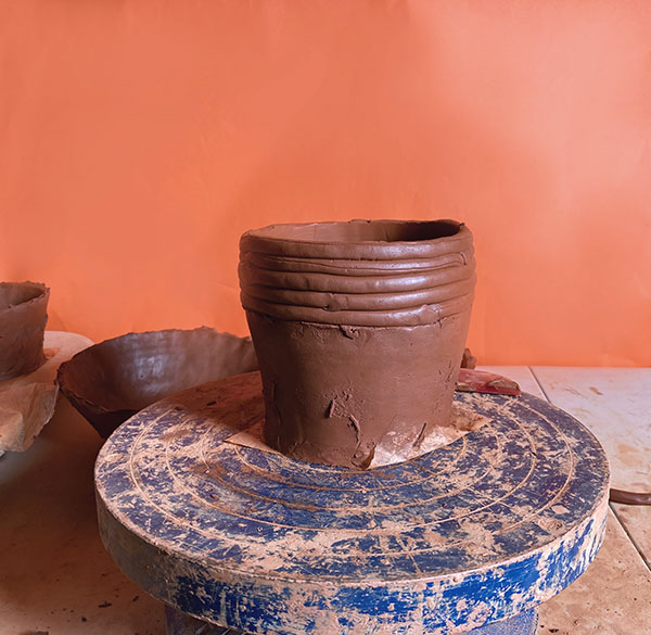 3 Allow the form to firm up to keep its shape and structure before adding more coils.