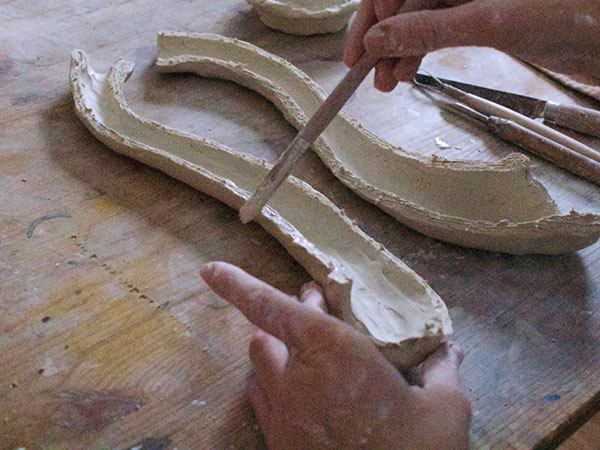6 After hollowing with a loop tool, slip and score the halves to join back together.