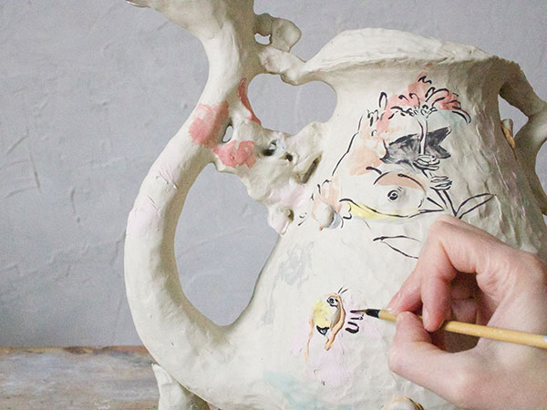 13 Apply defined brushstrokes in black glaze over the underpainting.