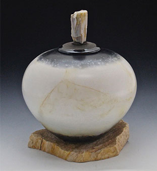 15 Ceramic Genealogy II, 10 in. (25 cm) in height, wheel-thrown earthenware, terra sigillata, saggar fired, cut and polished petrified-rock lid, rock base, 2014.