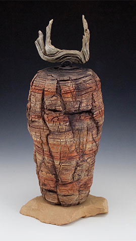 1, 2 Canyon Remnants and inspiration. 1 Canyon Remnants, 26 in. (66 cm) in height, wheel-thrown, carved, paddled, expanded, and eroded ceramic, stains, slips, underglazes, canyon varnish finish, fired multiple times, branch-handled lid, rock base.