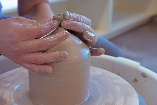 3 Close the top and pinch off excess clay from the final narrowing motions.