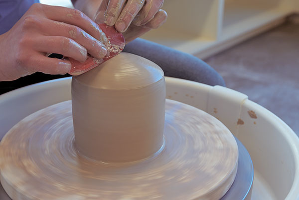 5 Use a flexible rib to create a smooth, domed top.