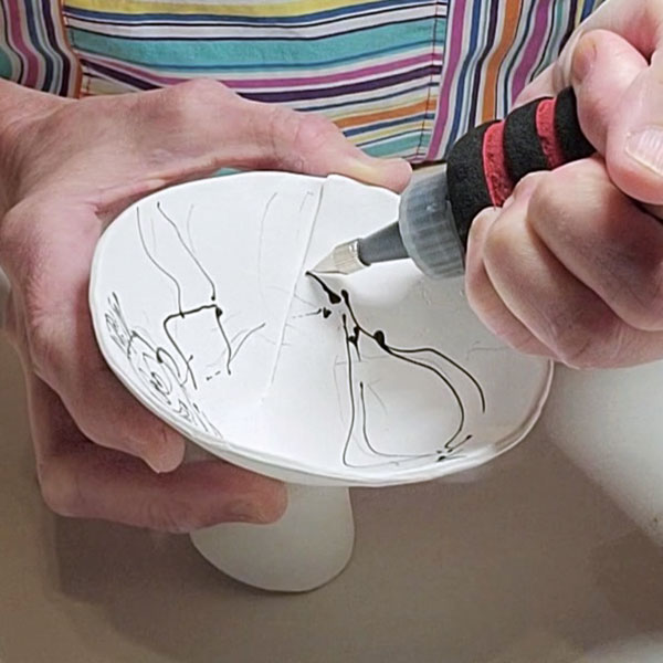 10 Use a fine-tip (0.3 mm) underglaze pen to create thin, delicate lines.