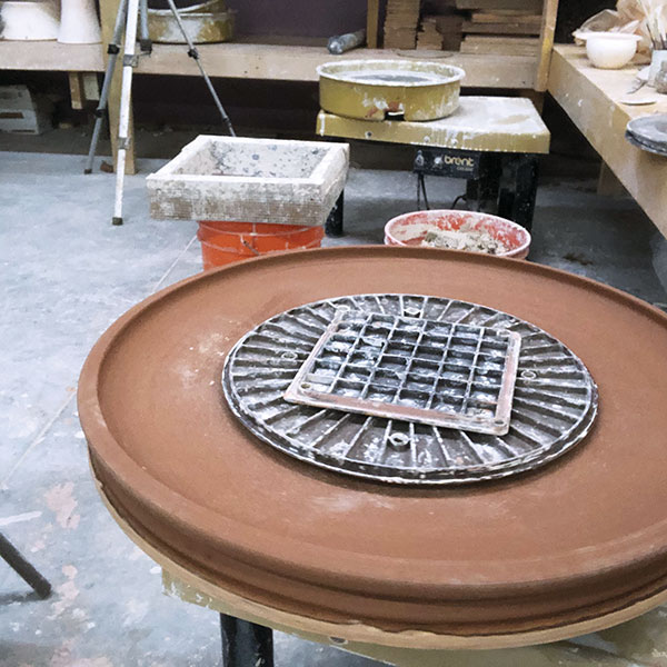 4 Center and stack a foam bat followed by several more bats onto the plate’s surface so that they are level with the plate rim.