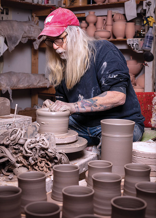 2 Terry Plasket throwing pots.