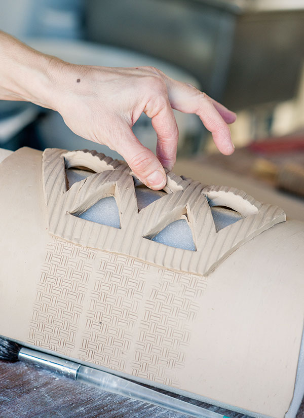 10 Pinch up opening divisions for an undulating rim.