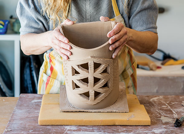 13 Score, slip, and attach the side slab. Use foam to keep the texture from being marred.