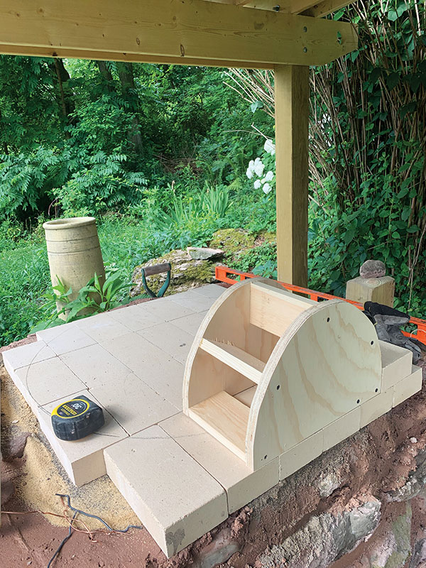 9. Place the arch form with shims under the form so it can be dropped and removed.
