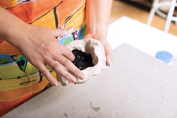 1 Combine porcelain with water, mix into a paste with your finger, then wedge.