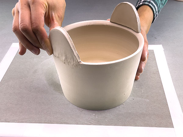 6 Affix each half moon to the rim and press firmly, working the edges together