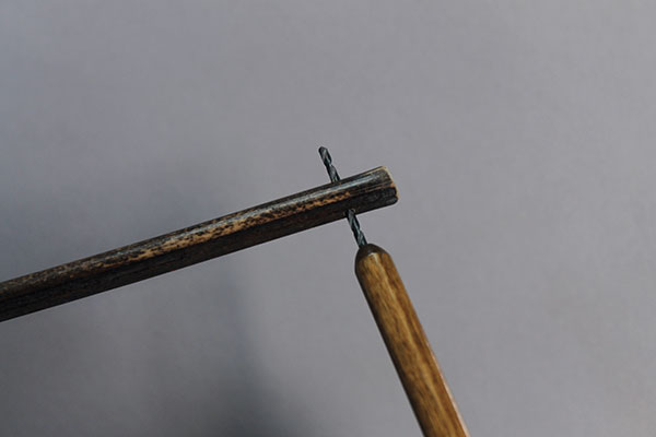 9 Drill a hole in the handle for hanging.