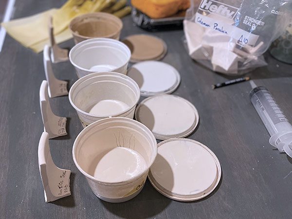1 A series of glaze tests, blended and applied to test tiles.
