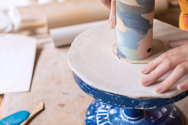 12 Attach the wrap vessel to the bottom slab. Cut around the base and blend together.