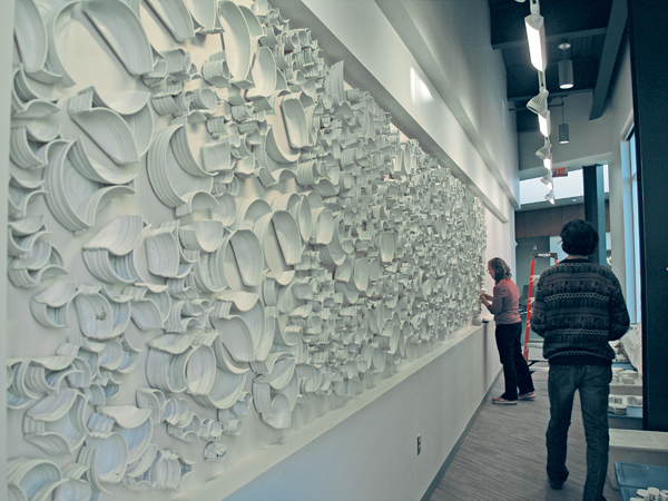 11 Monica Rudquist and volunteers from LifeSource installing Intersections at LifeSource in Minneapolis, Minnesota.