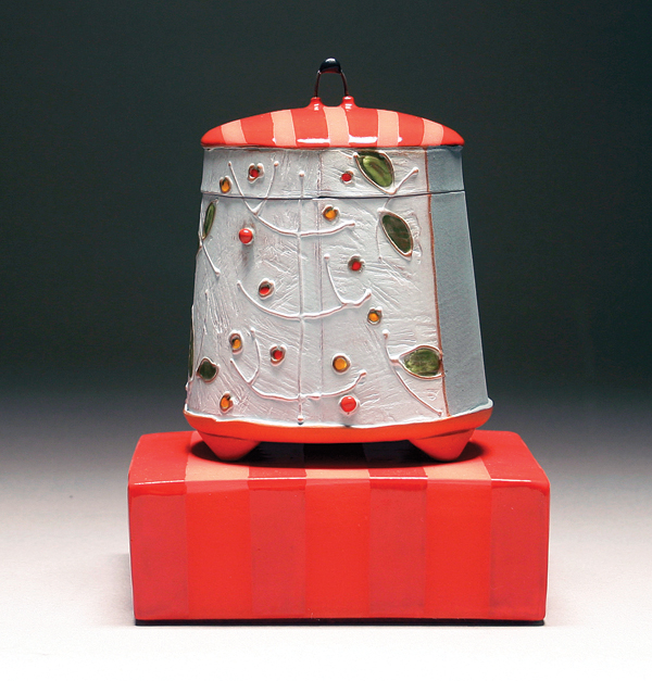 Lidded box on brick, handbuilt earthenware, slip-trailed patterns, terra sigillata, underglaze, glaze, wire, 2014.