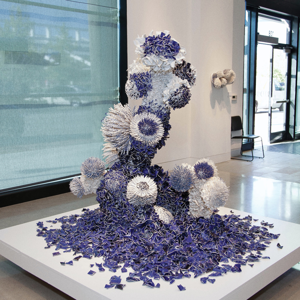 Large Peony and Peeping Tom, 6 ft. (1.8 m) in height, porcelain shards, clay, metal, 2014. Photo: Steven Michael.