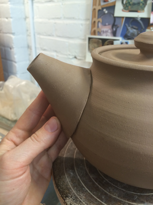 7 Test your fit and make adjustments as needed. Attach the teapot spout.