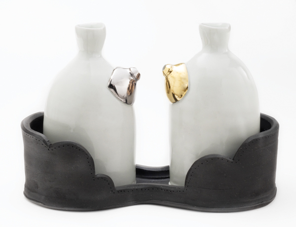 7 Anderson Bailey’s oil and vinegar with shiny blobs, 7½ in. (19 cm) in length, wheel-thrown and handbuilt porcelain, black stoneware, reduction fired to cone 10, metallic luster, 2013.