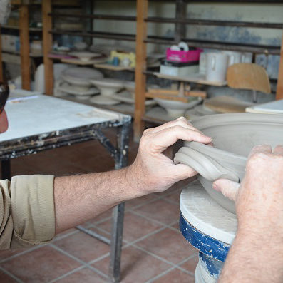4 Lug handles are added to the sides of the casserole dish.