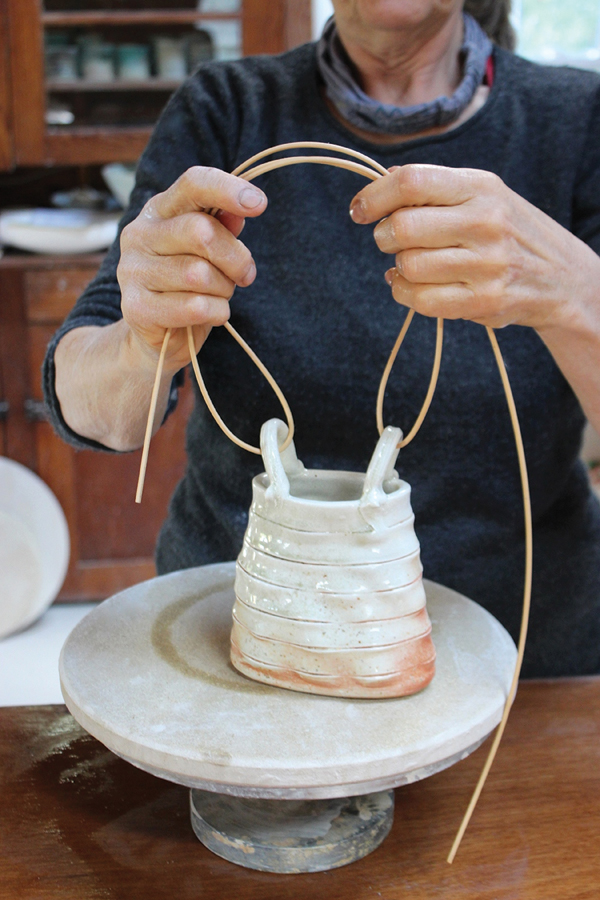13 Use a single round reed to measure the length for the handle. Allow extra for over lapping and securing the ends.